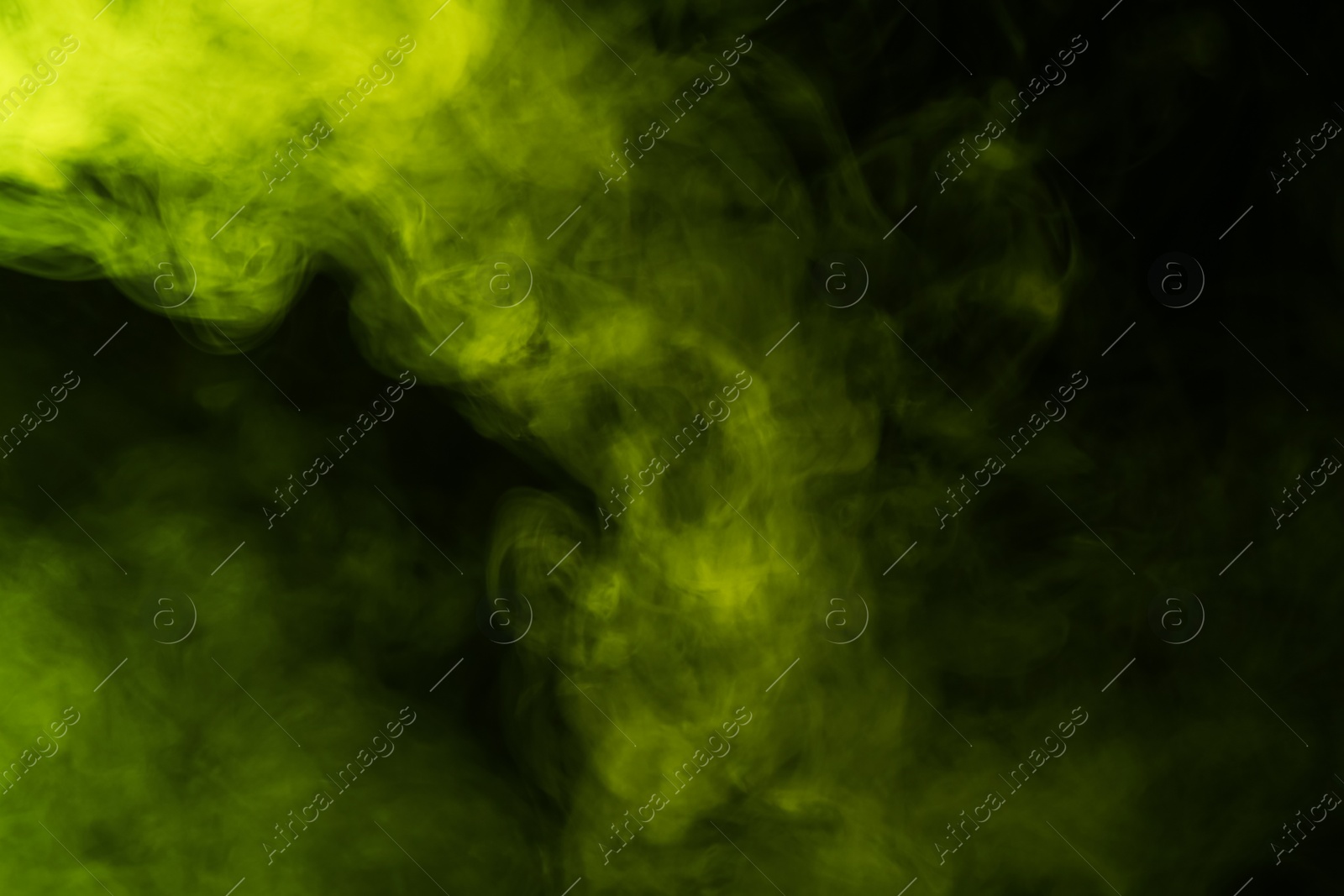 Hookah smoke in yellow light on black background, closeup Photo of Hookah smoke in yellow light on black background, closeup