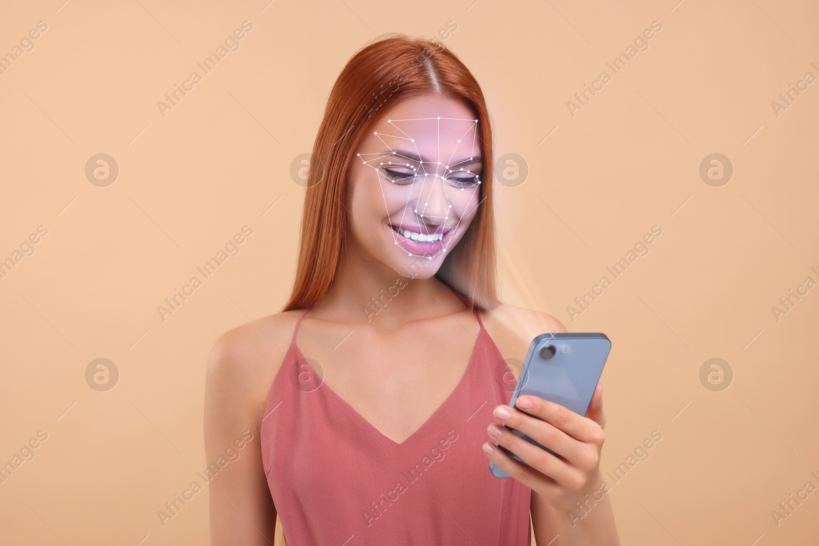Woman unlocking her smartphone with facial scanner against pale brown background. Biometric verification Image of Woman unlocking her smartphone with facial scanner against pale brown background. Biometric verification