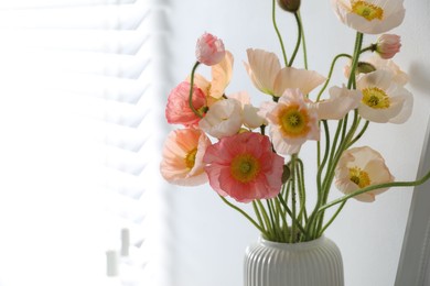 Photo of Bouquet of beautiful poppy flowers indoors, closeup. Space for text