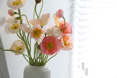 Photo of Bouquet of beautiful poppy flowers indoors, closeup. Space for text