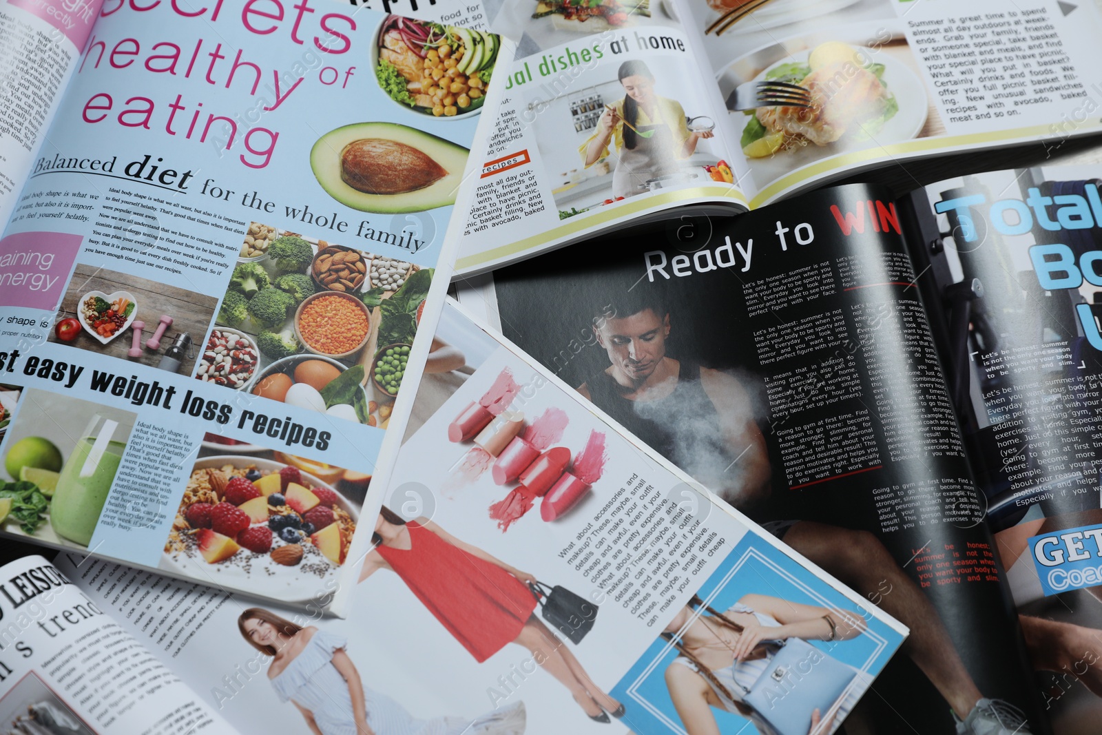 Many different trendy magazines as background, closeup Photo of Many different trendy magazines as background, closeup