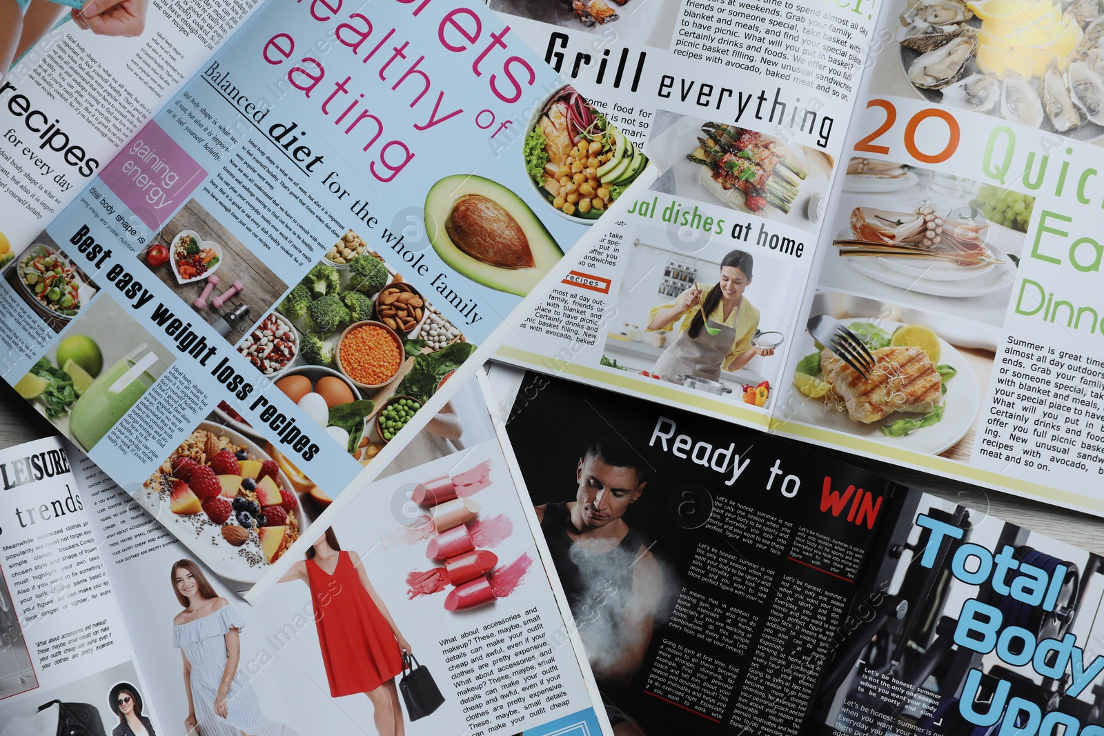 Photo of Many different trendy magazines as background, closeup