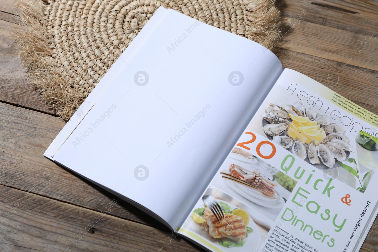 Open magazine on wooden background, closeup. Mockup for design Photo of Open magazine on wooden background, closeup. Mockup for design