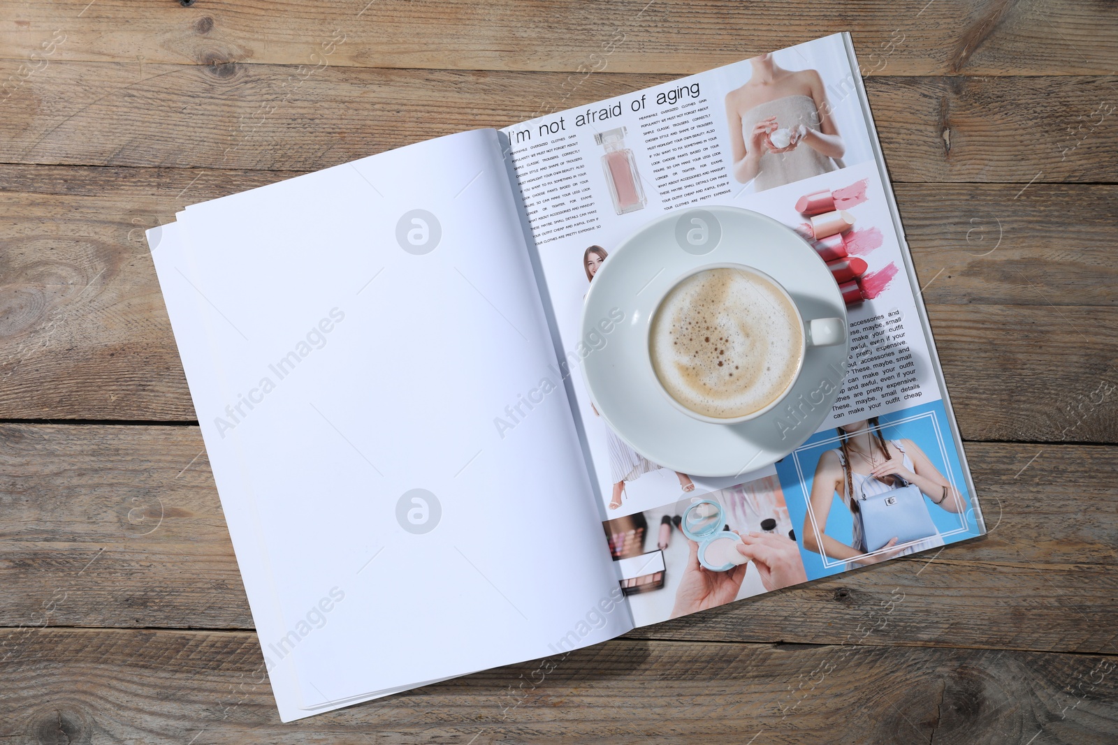 Open magazine and coffee on wooden background, top view. Mockup for design Photo of Open magazine and coffee on wooden background, top view. Mockup for design