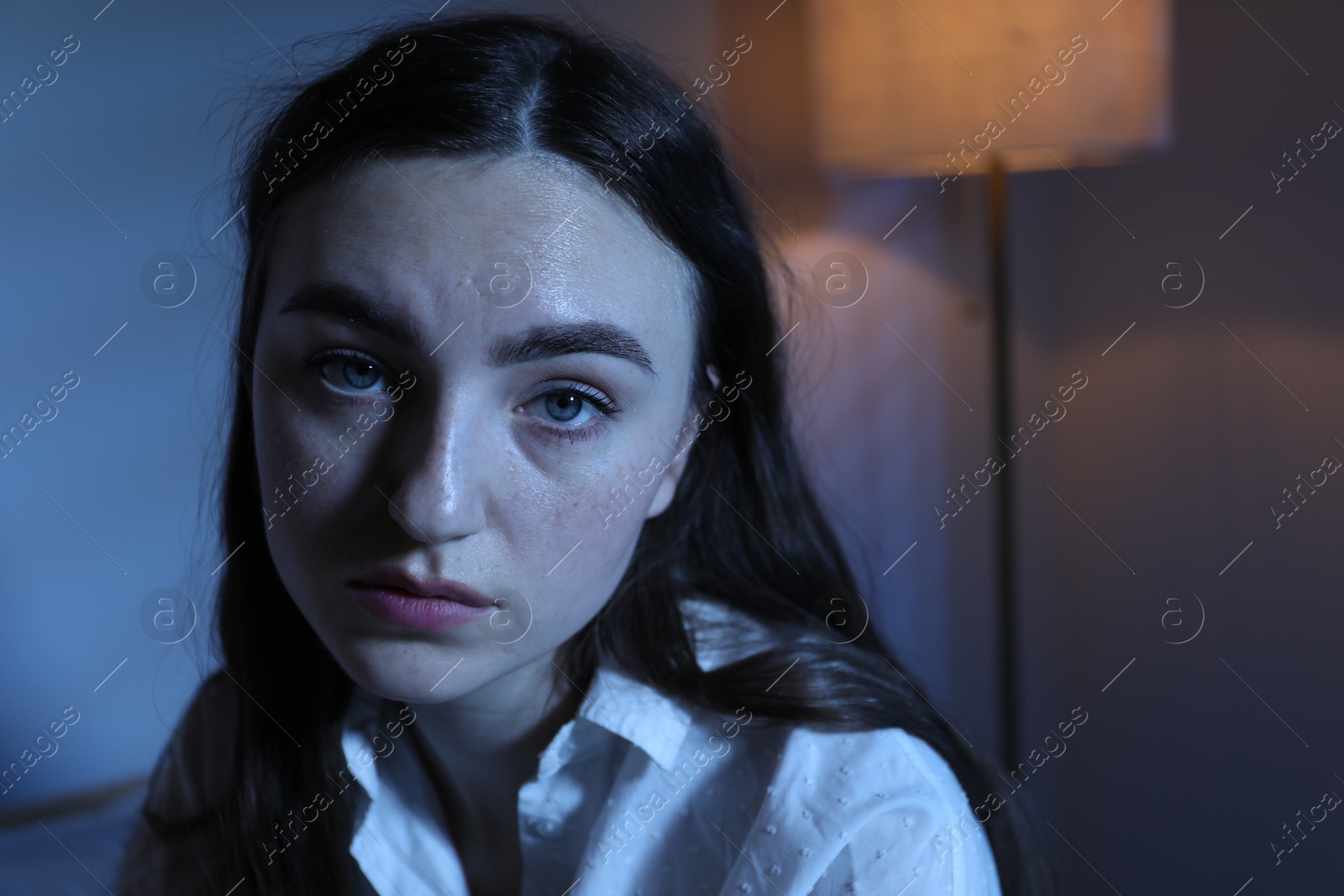 Frustrated woman suffering from insomnia at home Photo of Frustrated woman suffering from insomnia at home