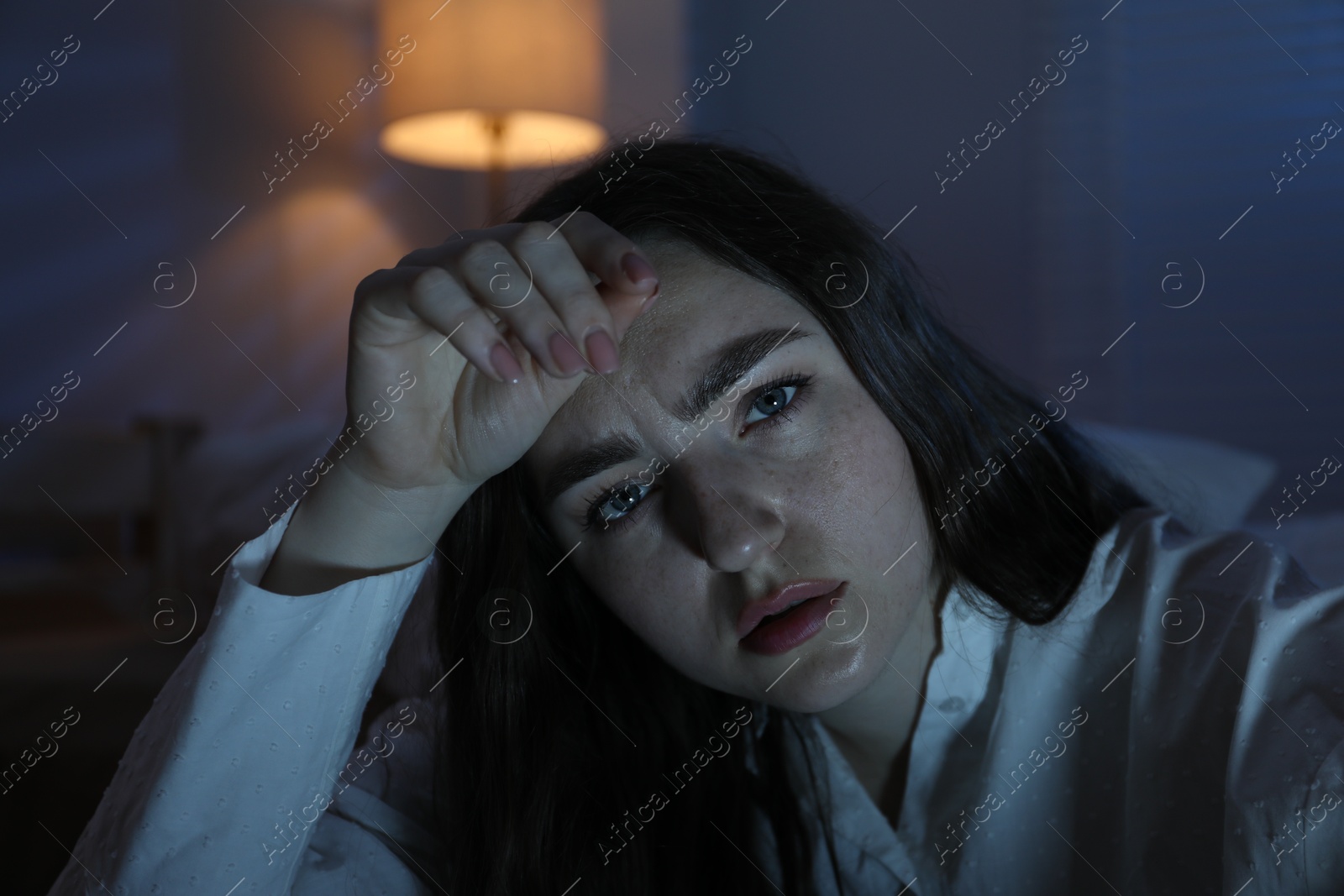 Frustrated woman suffering from insomnia at home Photo of Frustrated woman suffering from insomnia at home