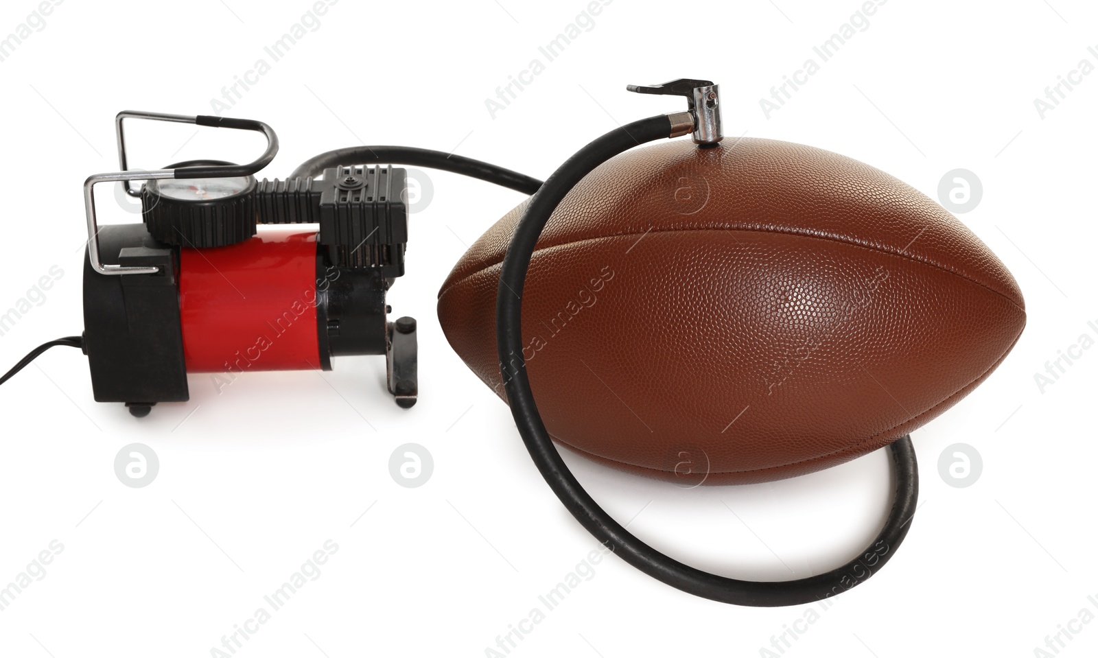 American football ball and air compressor isolated on white Photo of American football ball and air compressor isolated on white