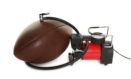 Photo of American football ball and air compressor isolated on white