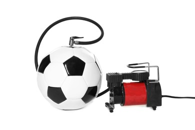 Photo of Soccer ball and air compressor isolated on white