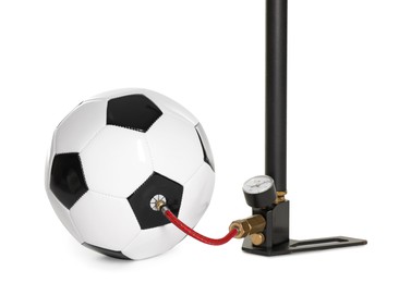 Photo of Soccer ball and manual air pump isolated on white