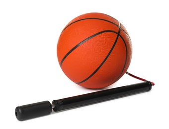 Photo of Basketball ball and manual air pump isolated on white