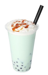 Photo of Tasty milk bubble tea in plastic cup isolated on white