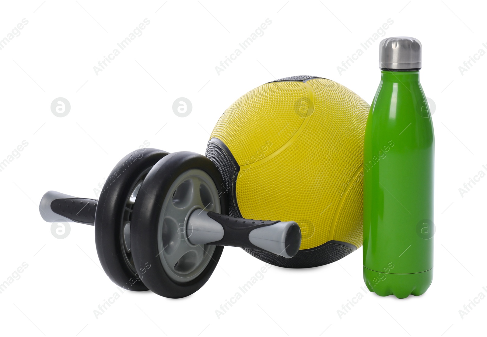 Medicine ball, water bottle and ab wheel isolated on white Photo of Medicine ball, water bottle and ab wheel isolated on white