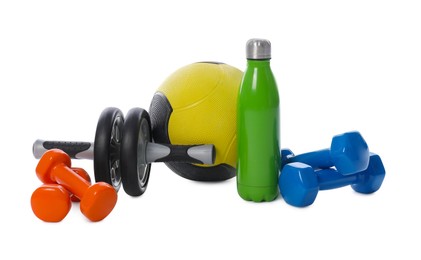 Photo of Medicine ball, dumbbells, water bottle and ab wheel isolated on white