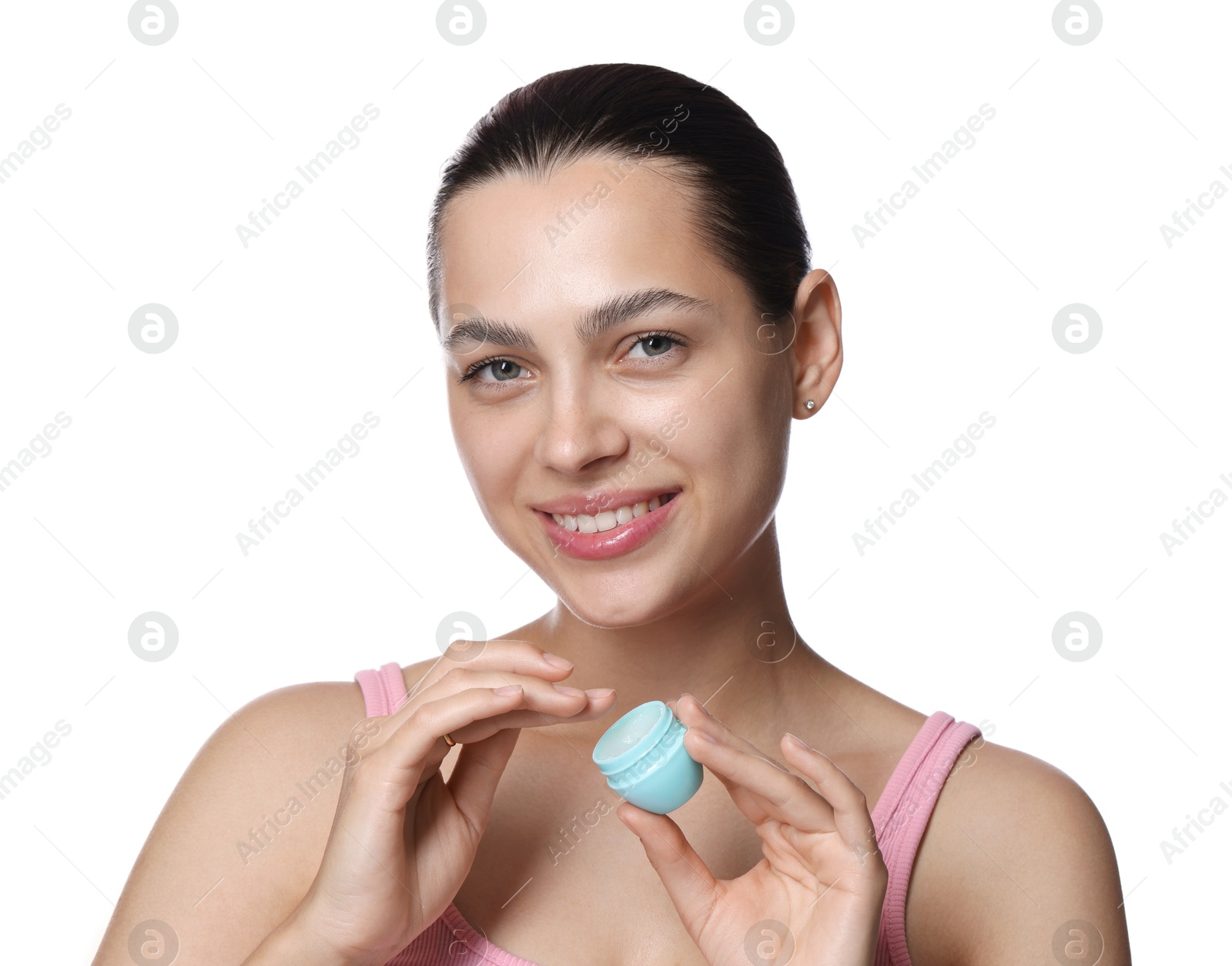 Photo of Young woman with lip balm on white background