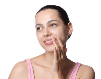 Photo of Young woman with lip balm on white background
