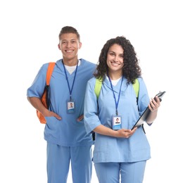 Photo of Medical students with clipboard on white background