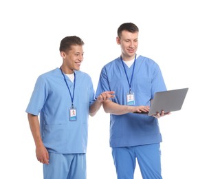 Photo of Medical students with laptop on white background