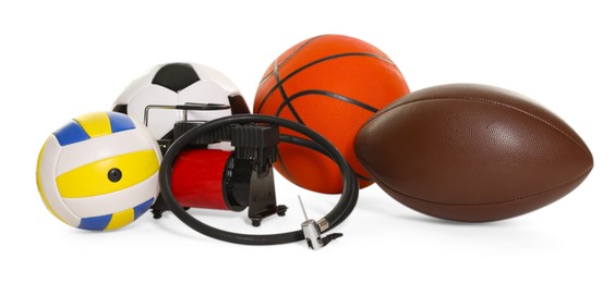 Photo of Different sport balls and air compressor isolated on white