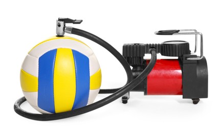Photo of Volleyball ball and air compressor isolated on white