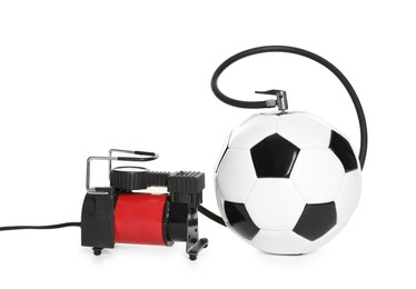 Photo of Soccer ball and air compressor isolated on white