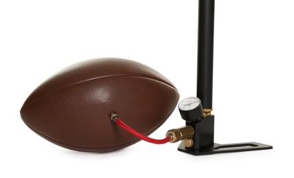 Photo of American football ball and manual air pump isolated on white