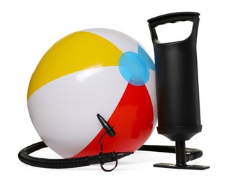Photo of Inflatable ball and manual air pump isolated on white