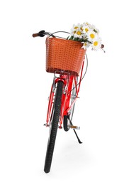 Photo of Bicycle with basket of beautiful flowers isolated on white