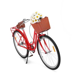 Photo of Bicycle with basket of beautiful flowers isolated on white