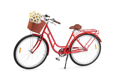 Photo of Bicycle with basket of beautiful flowers isolated on white