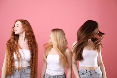 Photo of Beautiful women with different hair colors on pink background