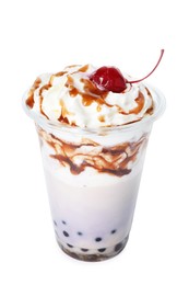 Photo of Tasty milk bubble tea in plastic cup isolated on white