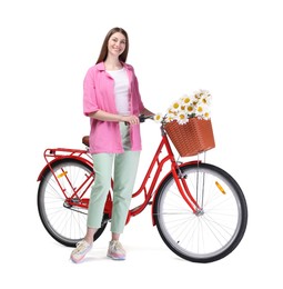 Photo of Smiling woman and bicycle with basket of flowers against white background