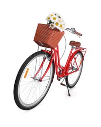 Photo of Bicycle with basket of beautiful flowers isolated on white