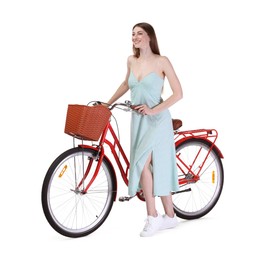 Photo of Smiling woman in dress and bicycle with basket against white background
