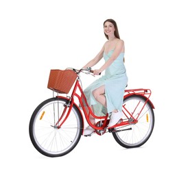 Photo of Smiling woman riding bicycle with basket on white background