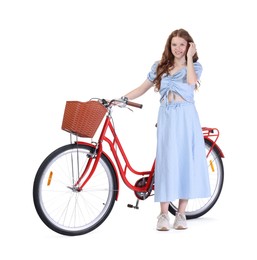 Photo of Smiling teenage girl and bicycle with basket on white background