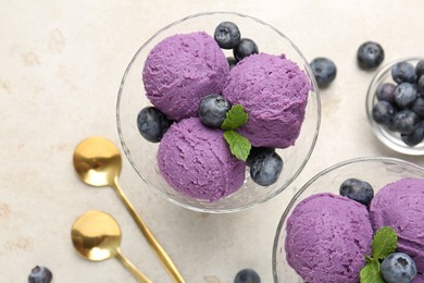 Photo of Tasty sorbet with blueberries and mint on light grey table, flat lay