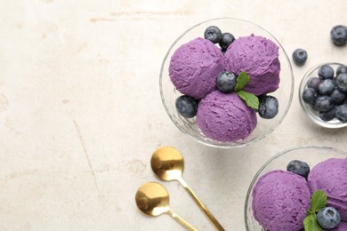 Photo of Tasty sorbet with blueberries and mint on light grey table, flat lay. Space for text