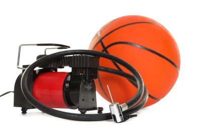 Photo of Basketball ball and air compressor isolated on white