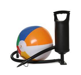 Photo of Inflatable ball and manual air pump isolated on white