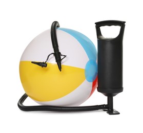 Photo of Inflatable ball and manual air pump isolated on white