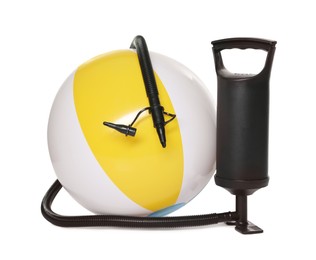 Photo of Inflatable ball and manual air pump isolated on white