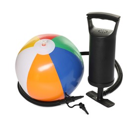 Photo of Inflatable ball and manual air pump isolated on white