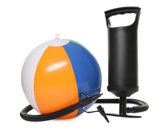 Photo of Inflatable ball and manual air pump isolated on white