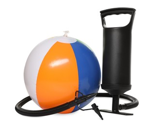 Photo of Inflatable ball and manual air pump isolated on white