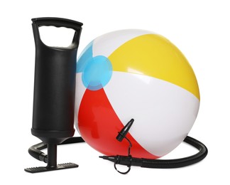 Photo of Inflatable ball and manual air pump isolated on white