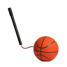 Photo of Basketball ball and manual air pump isolated on white