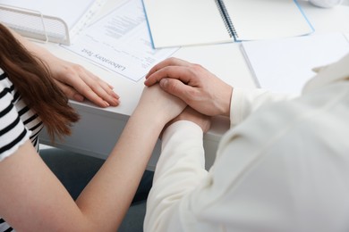 Photo of In vitro fertilization (IVF). Couple visiting reproductive clinic, closeup