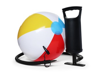 Photo of Inflatable ball and manual air pump isolated on white